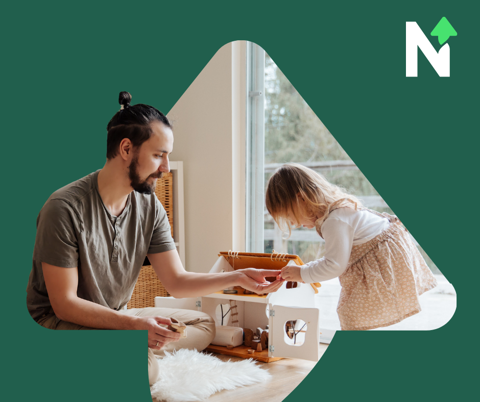 A man and a young toddler girl playing with toys